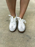 White Sneakers with Gold Trim