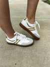 White Sneakers with Gold Trim