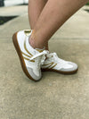 White Sneakers with Gold Trim