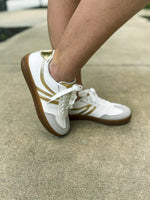 White Sneakers with Gold Trim