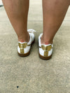 White Sneakers with Gold Trim