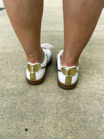 White Sneakers with Gold Trim